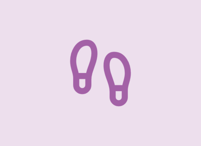 Decorative abstract illustration of two purple loops on a light lavender background.