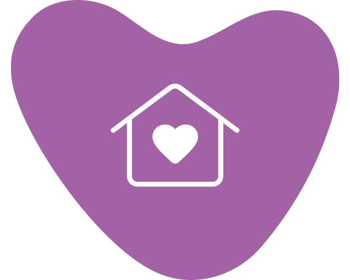 White house icon with a heart at its center on a purple, irregularly shaped background, conveying home and care